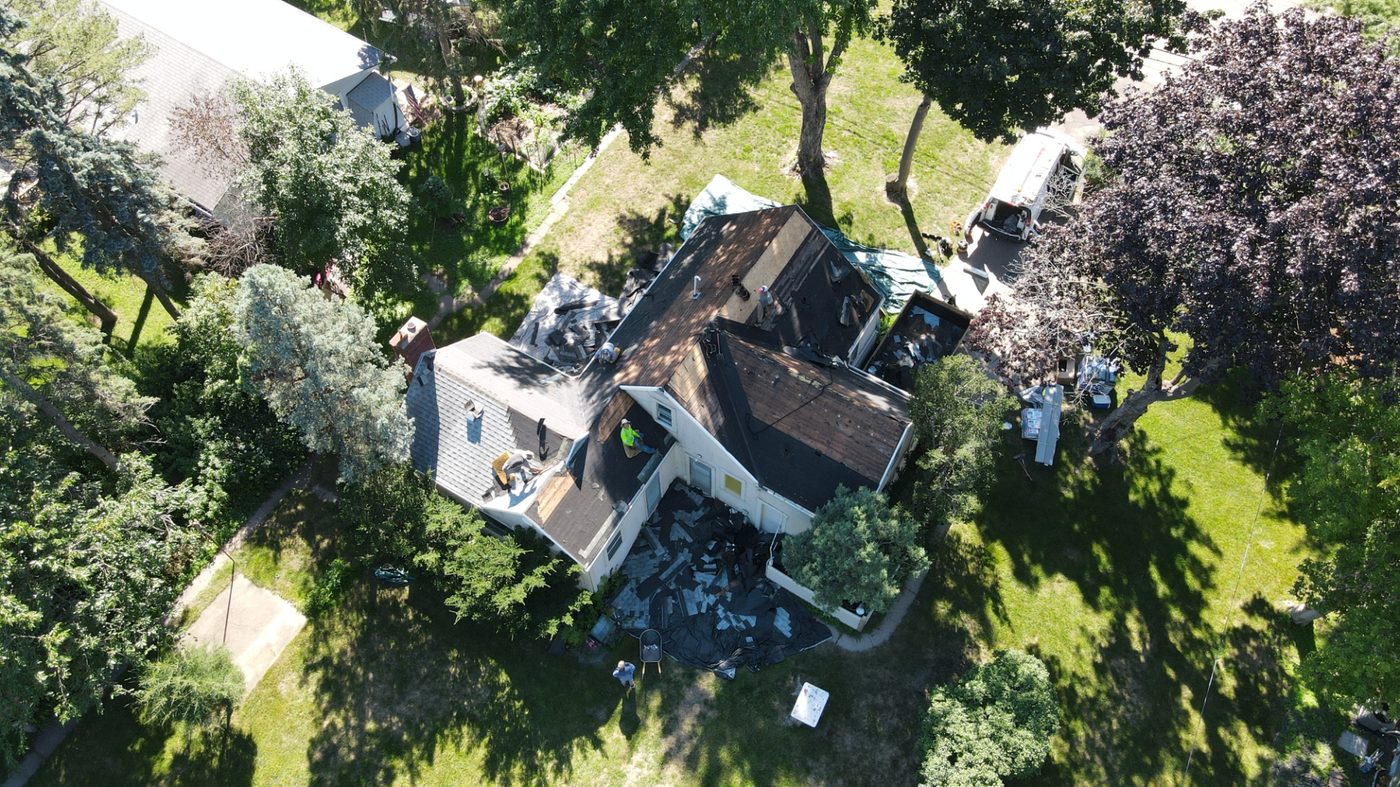 Aerial view of full roof tear-off in progress with Sellers Roofing crew